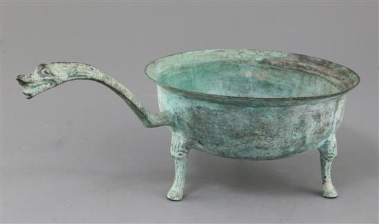 A Chinese archaic bronze tripod wine-warming vessel, Jiao Dou, Eastern Han dynasty, 1st-3rd century A.D., 13.5cm high, 32cm long